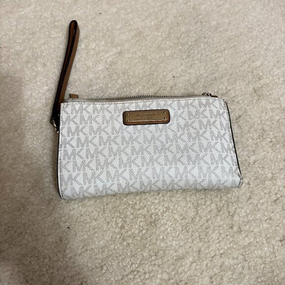 Michael Kors Handbags - Michael Kors Jet Set Travel Large Wristlet Wallet – Brown MK Logo